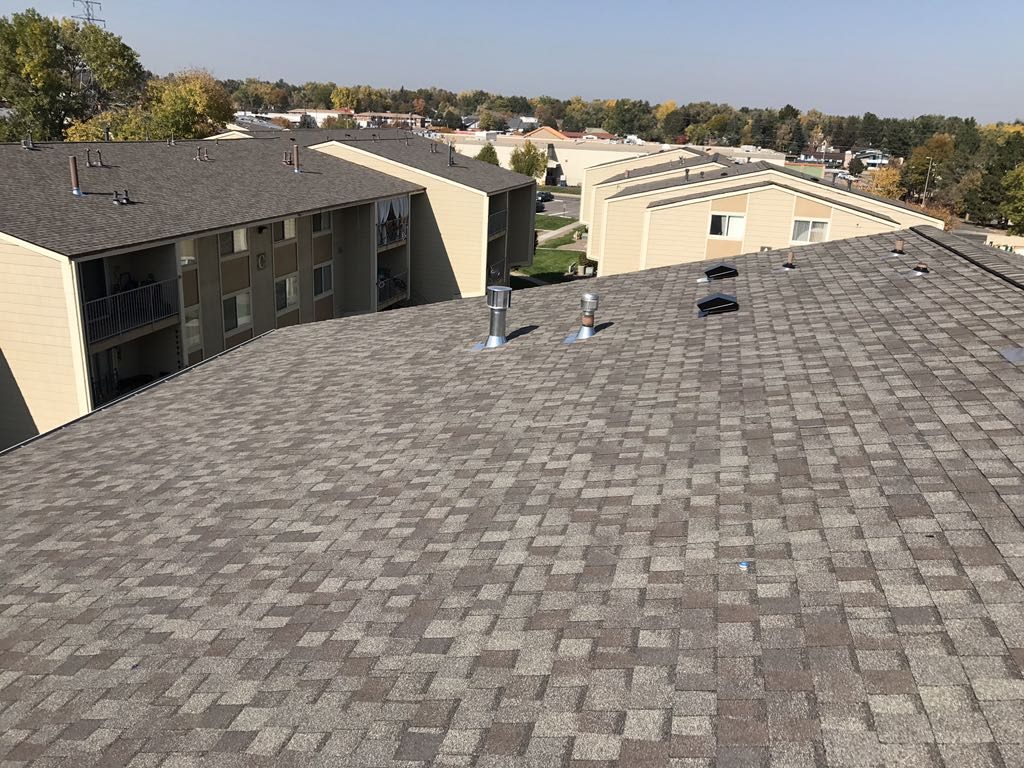 Photo of gray roof on apartment building